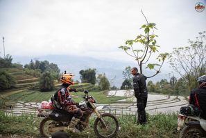 Vietnam Motorcycle Adventure: Riding Through Ha Giang’s Rice Planting Seasons.