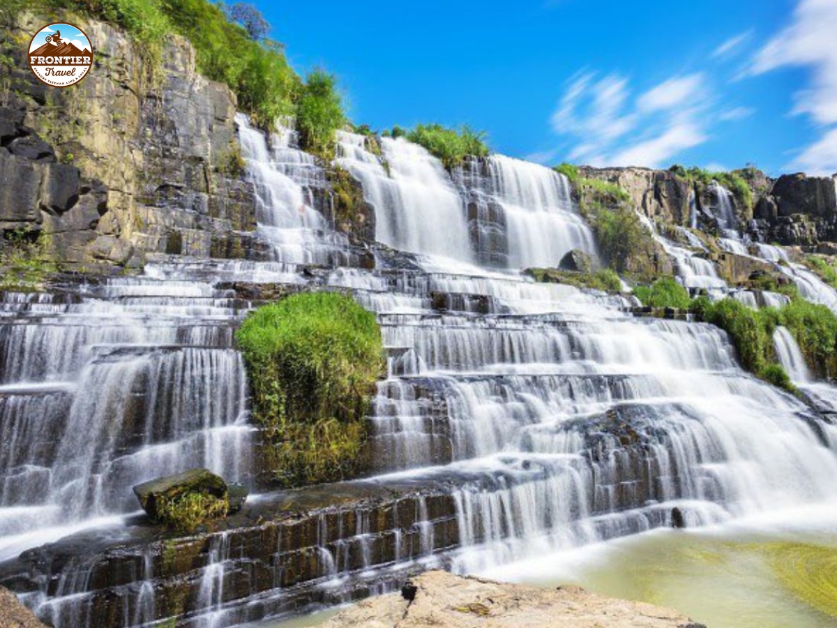 Exploring majestic waterfalls on a motorcycle trip in Vietnam