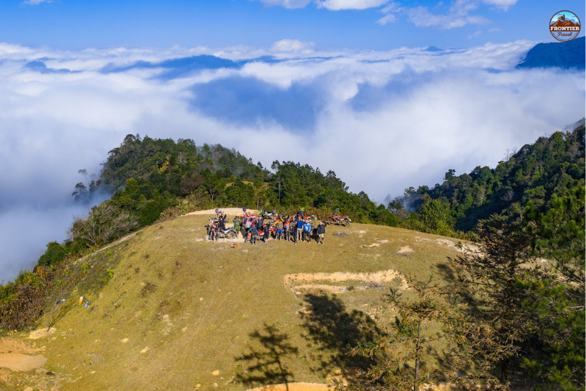 Spectacular cloud-hunting view with rolling mist blanketing Ha Giang’s mountains.