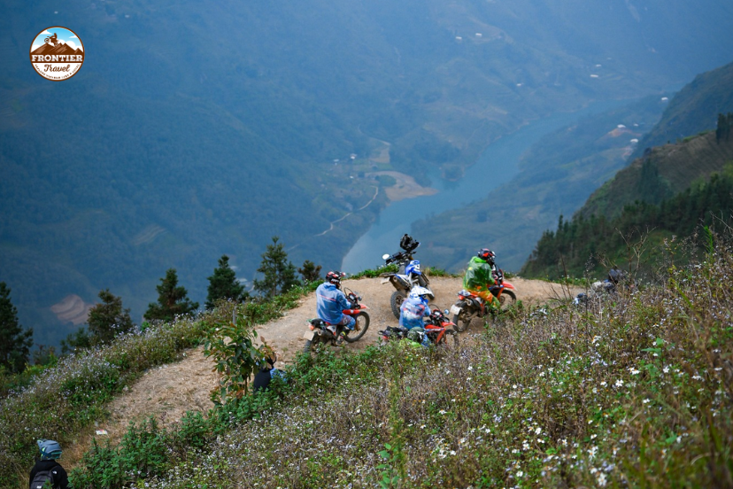 Frontier Travel Vietnam motorcycle tour crossing a highland mountain pass in northern Vietnam.