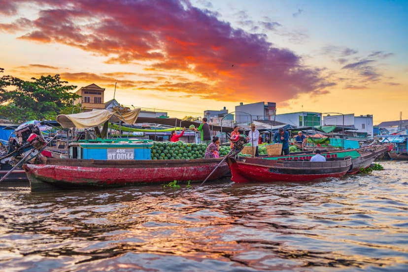 Trading activities on the river at Cai Rang floating market, Can Tho.