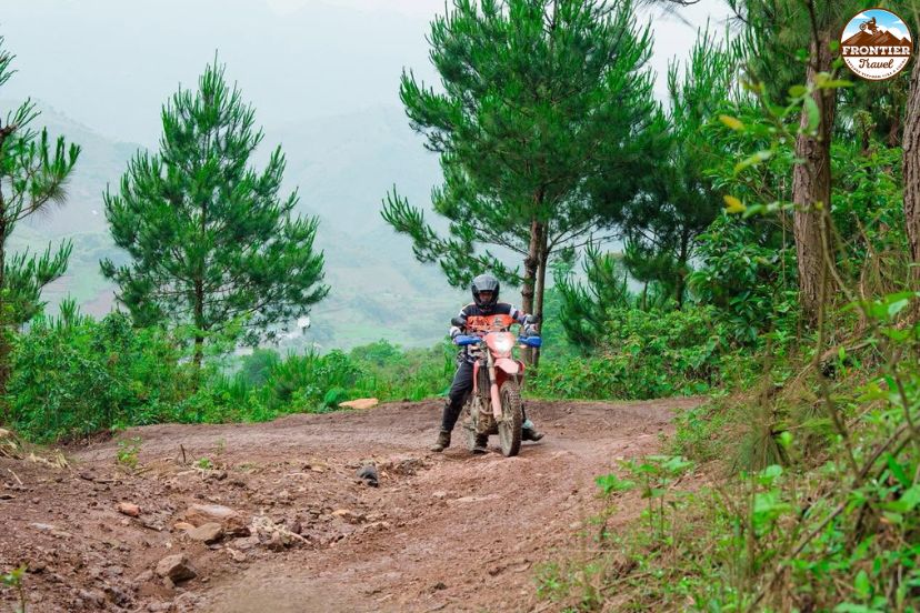 Adventure riding through fog and mountain scenery