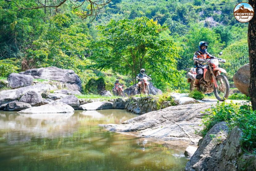 Exploring Thac Ba Lake villages by motorbike