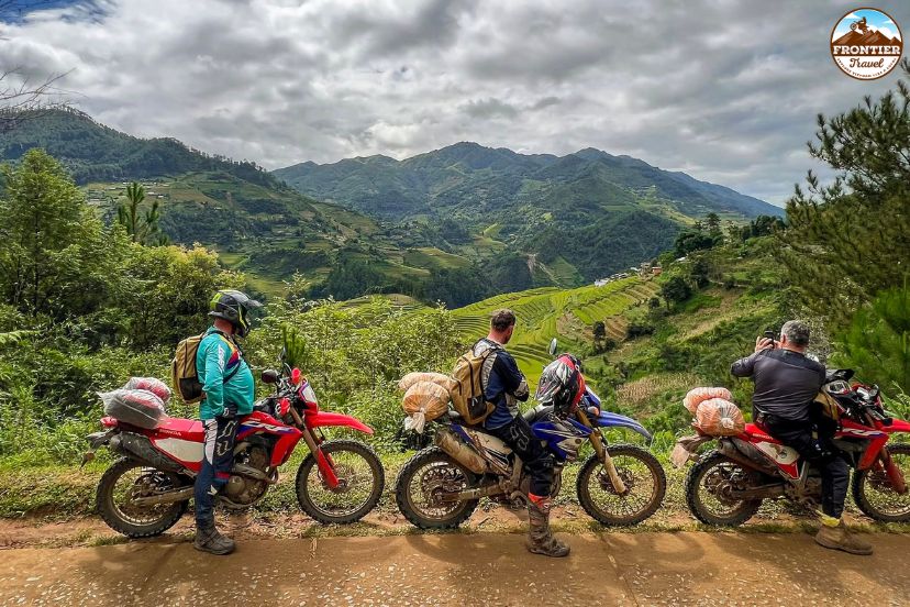 Motorbike journey through terraced mountain landscapes