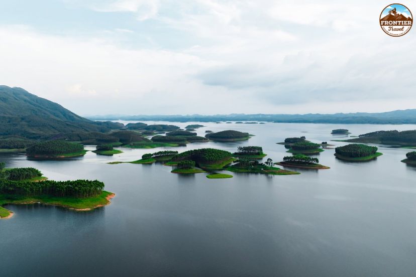 Peaceful lake surrounded by Northern Vietnam mountains