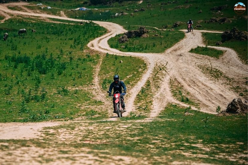 Contacting trusted Ha Giang Loop tour companies during autumn for crisp mountain air.
