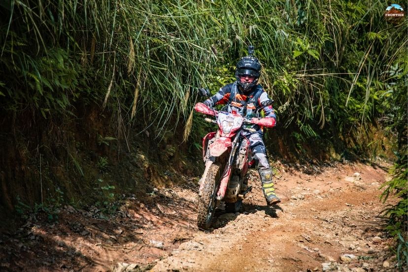 Following old military logistics channels through deep jungle zones.