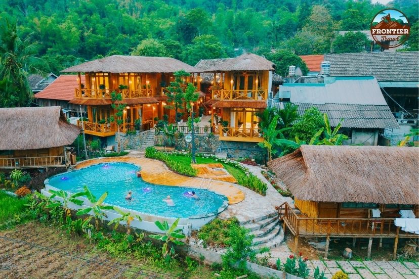Resting at a secluded village stilt house after grueling trail segments.