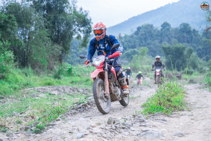 Riding through Lung Lo Pass toward peaceful Nghia Lo valley 