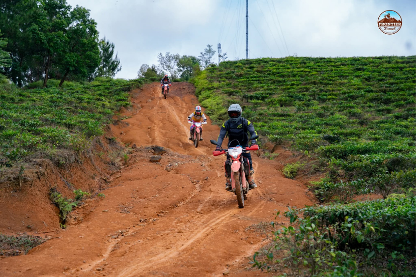 Riders navigating changing mountain roads with guide safety briefings provided 