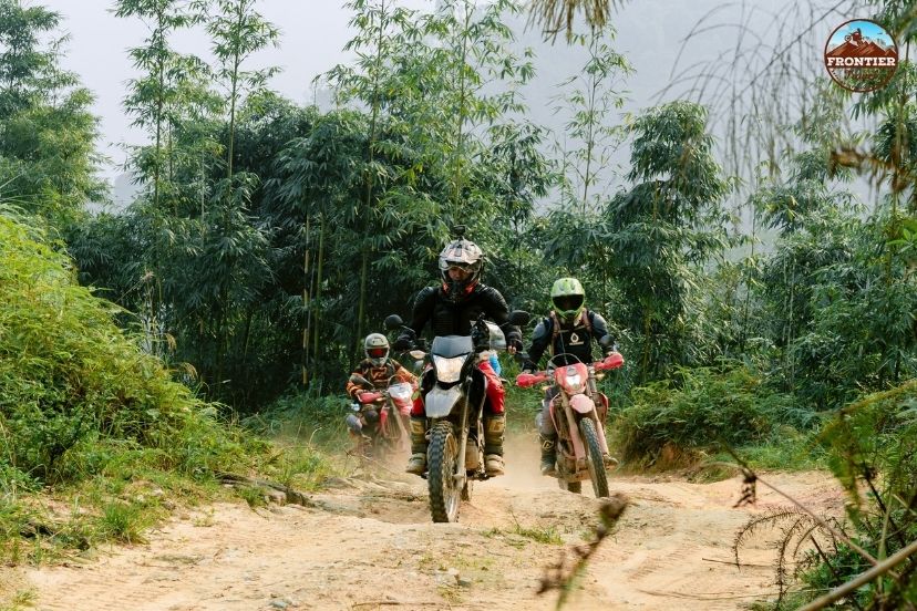 A guided group tour exploring the scenic rural landscapes of Vietnam