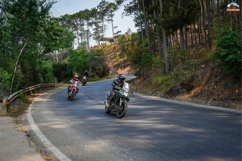 Honda Transalp 750 tackling light off-road terrain and gravel paths