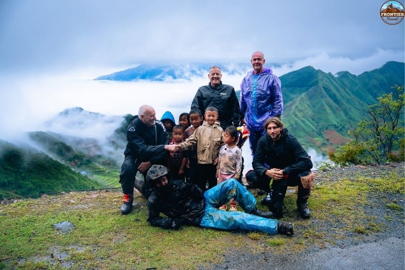 International travelers discovering scenic things to do ha giang besides motorbike loop