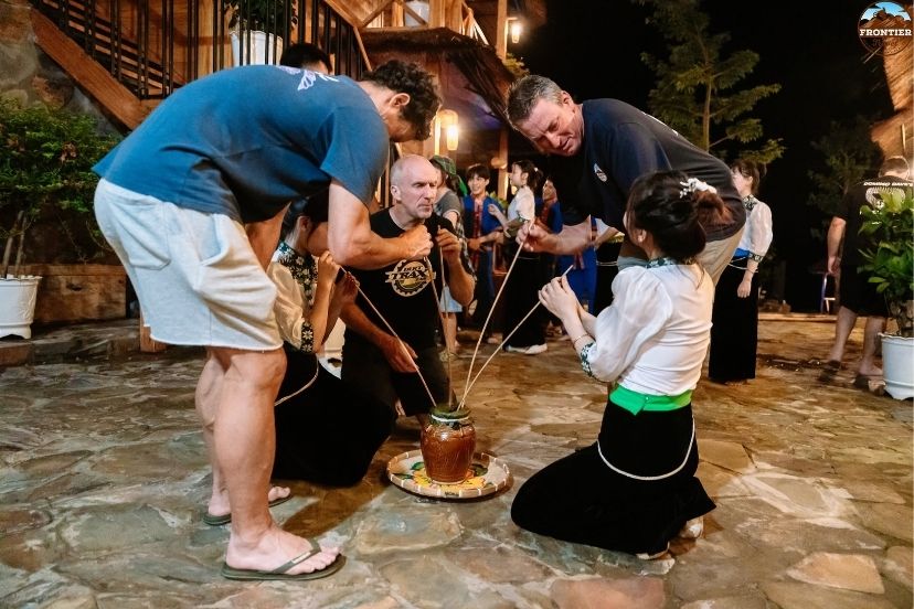 Local food stalls bustling with travelers at a weekend highland market