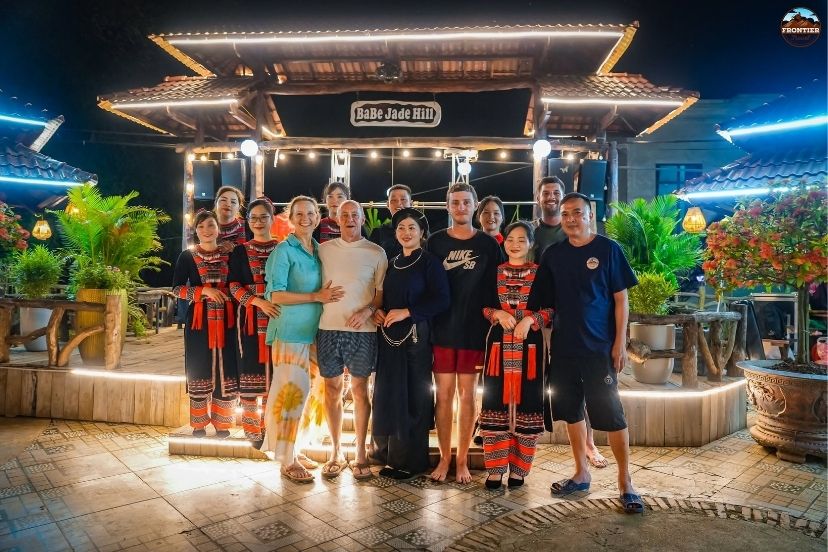 Riders sharing a cozy family style dinner at a local valley homestay 