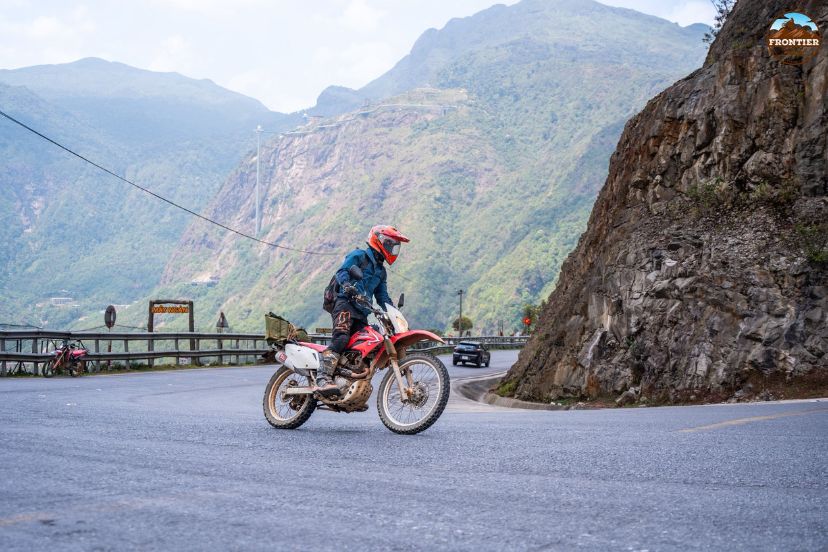 Dual sport motorbike riding on Vietnam jungle trails