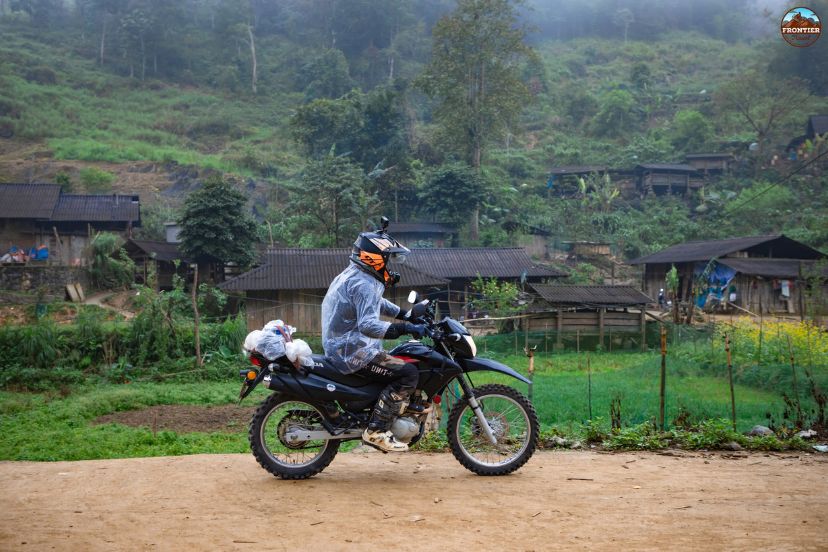 Foreigner riding motorbike in Vietnam mountain road