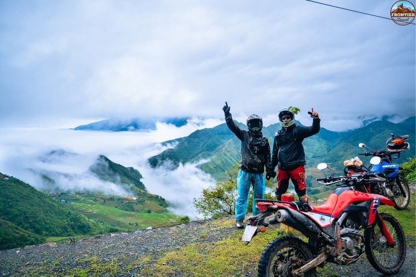 Frontier Travel Vietnam guides leading a safe motorbike tour through Ha Giang