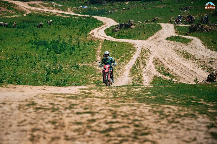 Guided motorbike tour exploring remote villages Vietnam