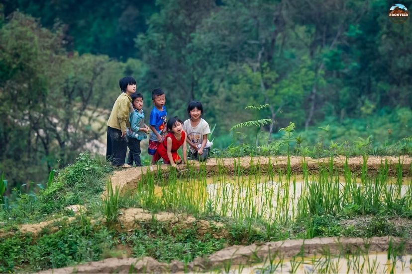 Travelers checking Ha Giang Loop route notes before visiting Nho Que River